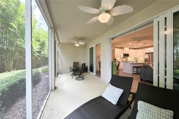 a view of a living room and dining room