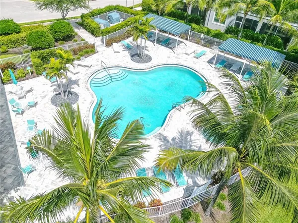 a view of a swimming pool with a garden