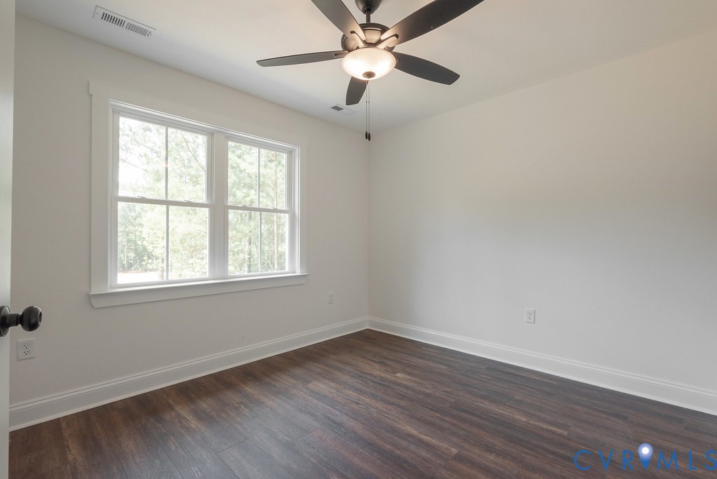 3844 Maidens Road Powhatan, VA 23139 - Photo 40 of 49 Empty room with dark wood-style floors and ceiling