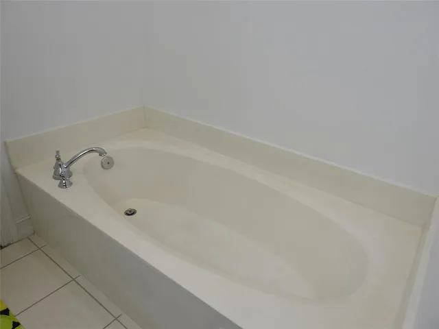 a bathroom with bathtub