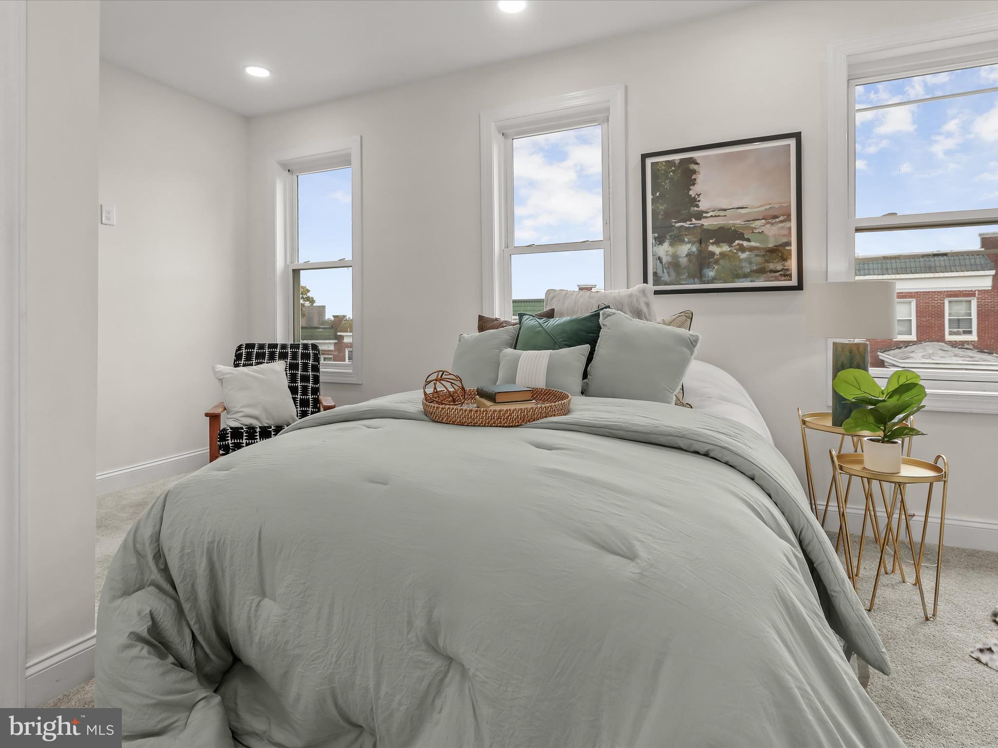 732 Edgewood Street Baltimore, MD 21229 - Photo 21 of 41 a bedroom with a bed and a window