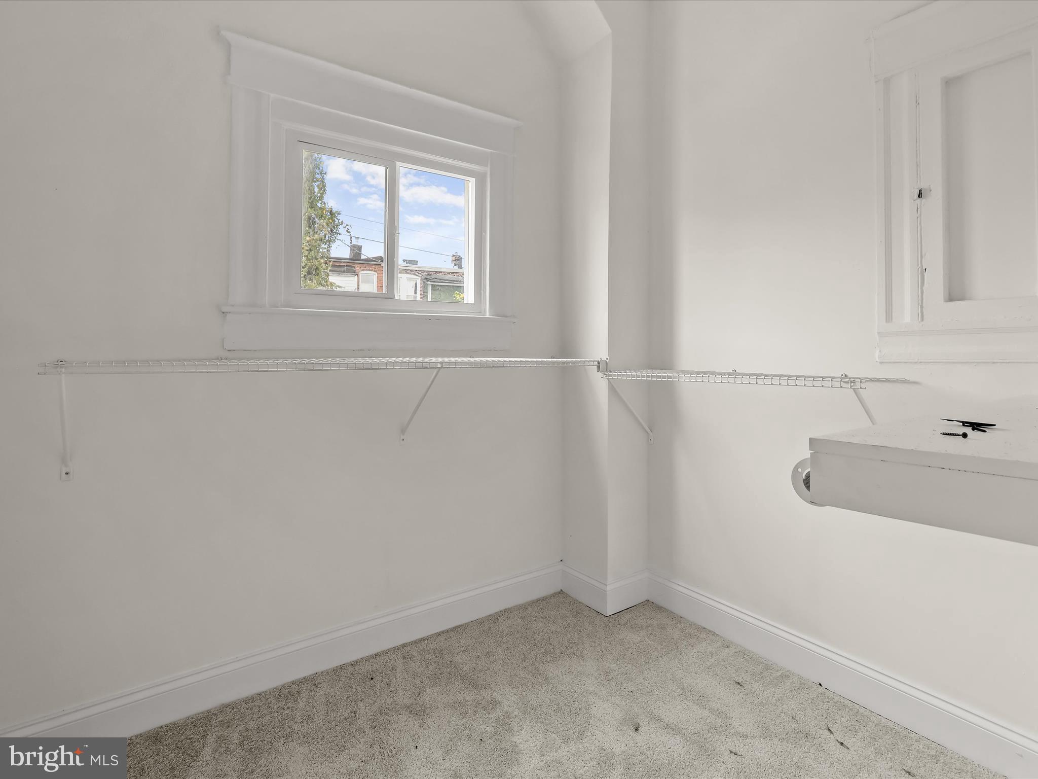 732 Edgewood Street Baltimore, MD 21229 - Photo 26 of 41 an empty room with a window