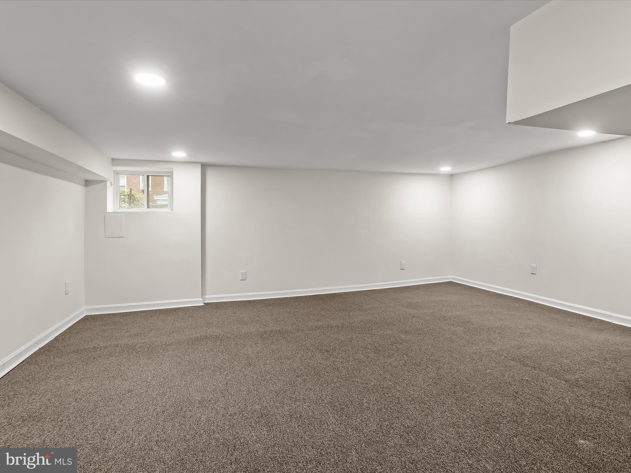 732 Edgewood Street Baltimore, MD 21229 - Photo 31 of 41 an empty room with a empty space and windows