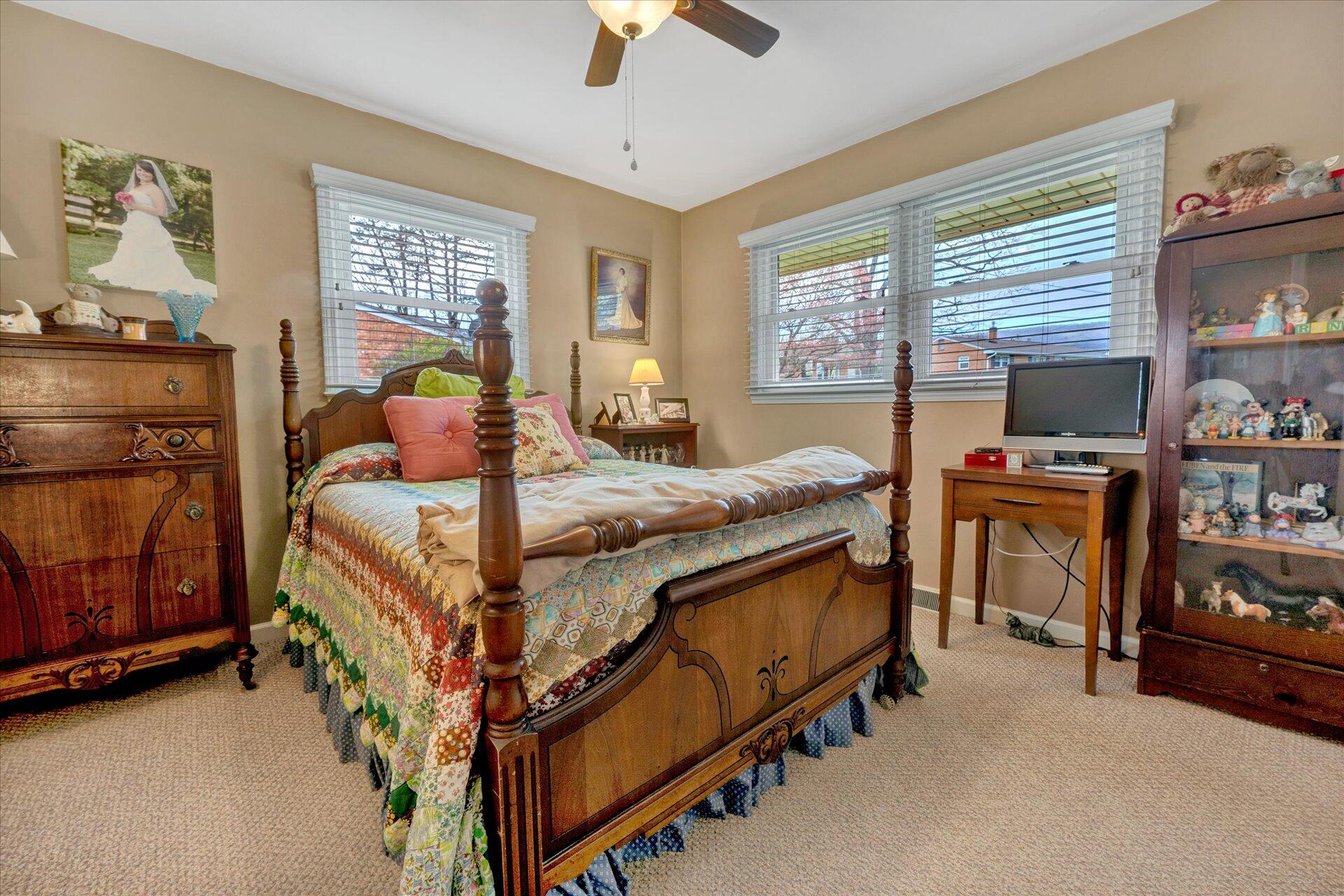 111 Deep Dell Road Salem, VA 24153 - Photo 12 of 39 a bed room with a bed and a tv