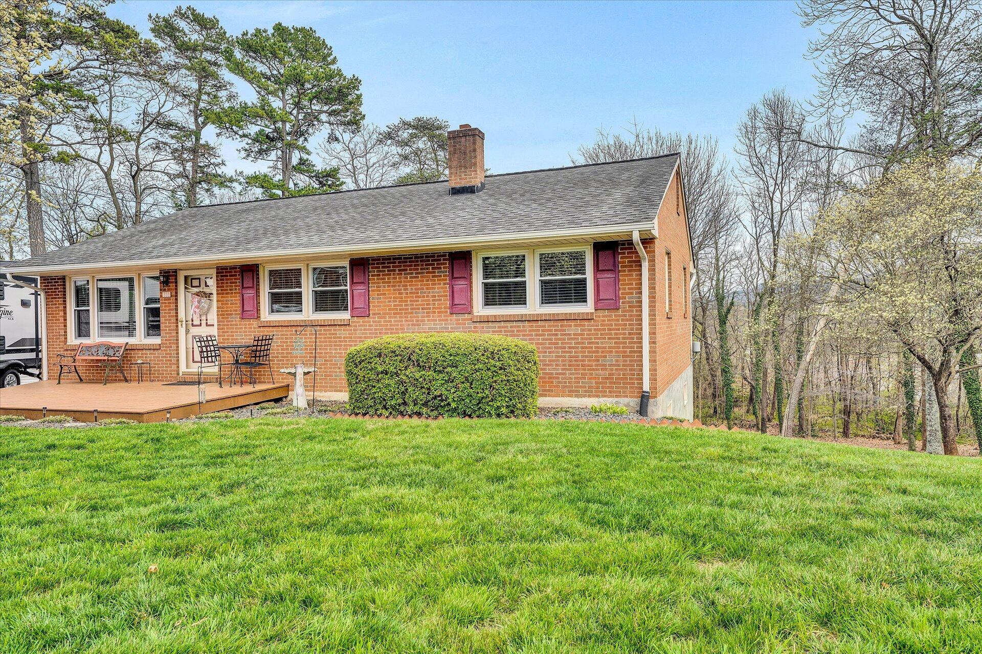 111 Deep Dell Road Salem, VA 24153 - Photo 3 of 39 a front view of house with yard and green space