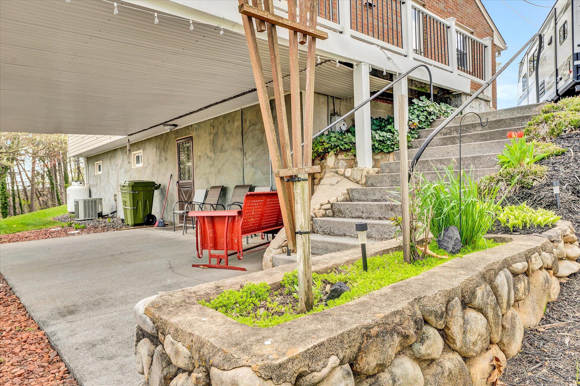 111 Deep Dell Road Salem, VA 24153 - Photo 32 of 39 a view of an chairs and bench in the patio
