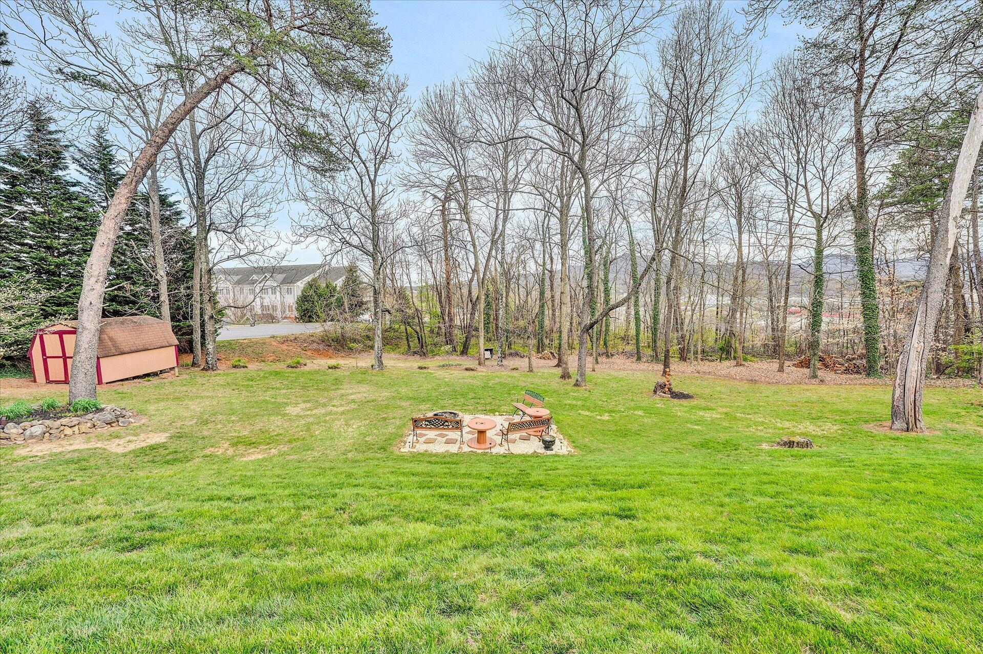 111 Deep Dell Road Salem, VA 24153 - Photo 33 of 39 a backyard of apartments with large trees