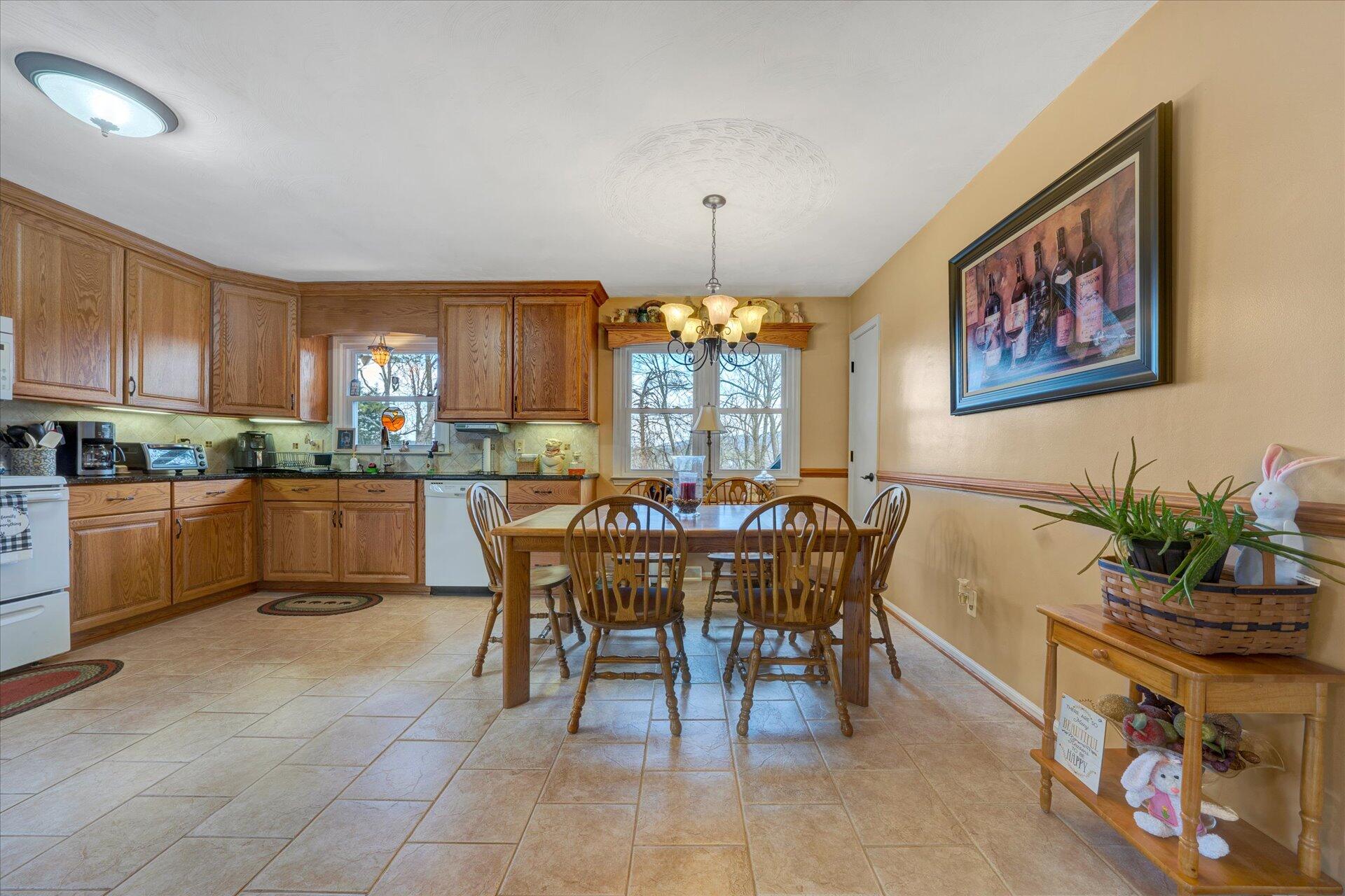 111 Deep Dell Road Salem, VA 24153 - Photo 6 of 39 a view of a dining room with furniture window and outside view
