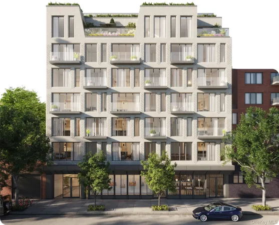 a front view of a building with lot of windows