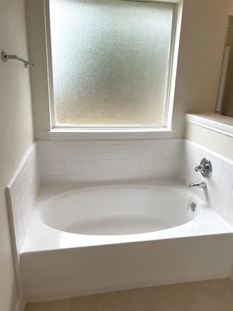 a bathroom with a bathtub