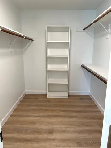 a view of an empty walk in closet