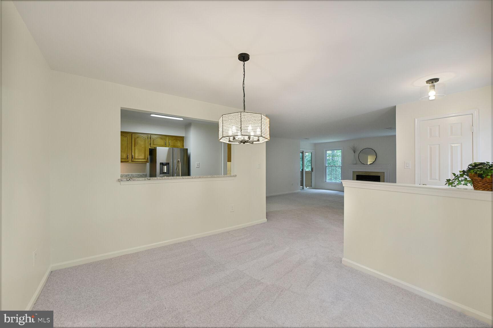 1497 Church Hill Place Reston, VA 20194 - Photo 10 of 30 Dining room looking to Family room