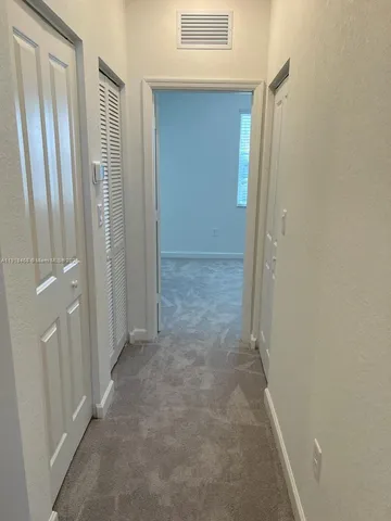 a bathroom with a sink toilet and vanity