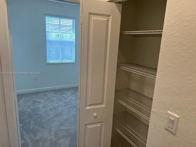 a bathroom with a shower and toilet