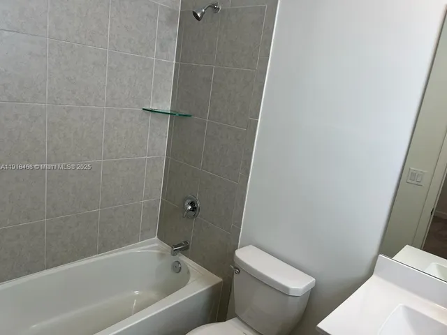 a potted plant in front of a door