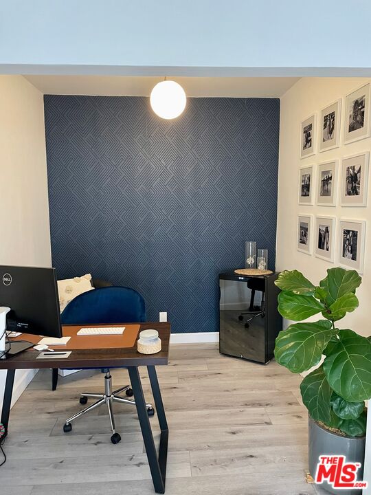 11906 Gorham Avenue, Unit 4 Los Angeles, CA 90049 - Photo 7 of 11 a workspace with furniture