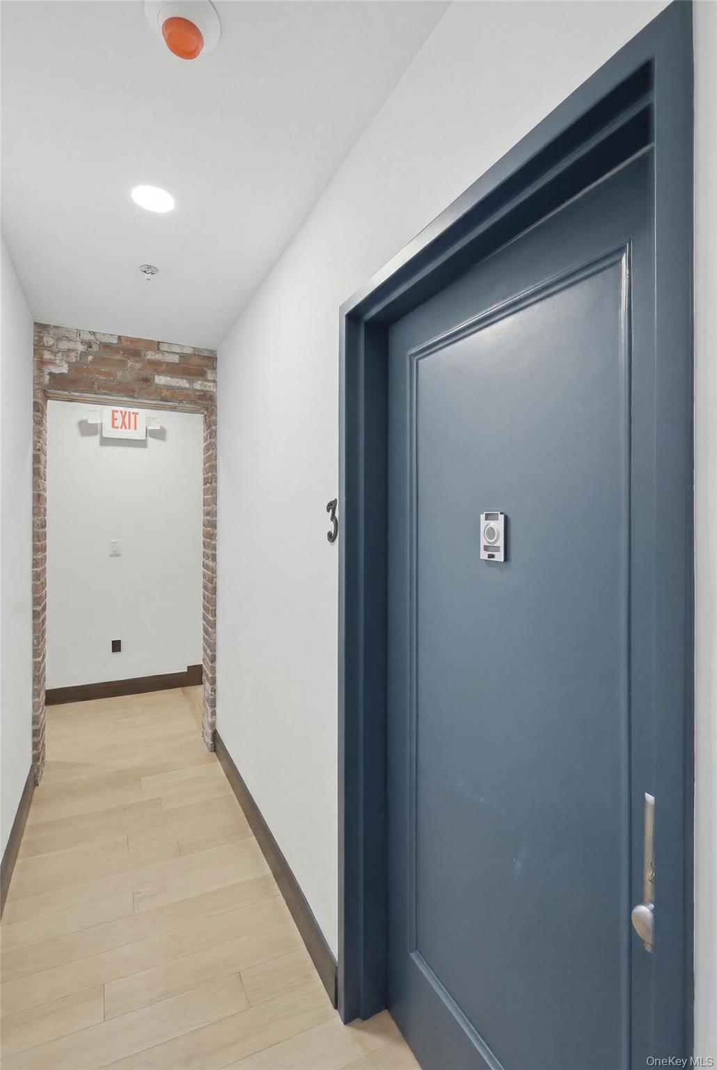207 Main Street, Unit 3 Beacon, NY 12508 - Photo 5 of 23 a view of a hallway with closet