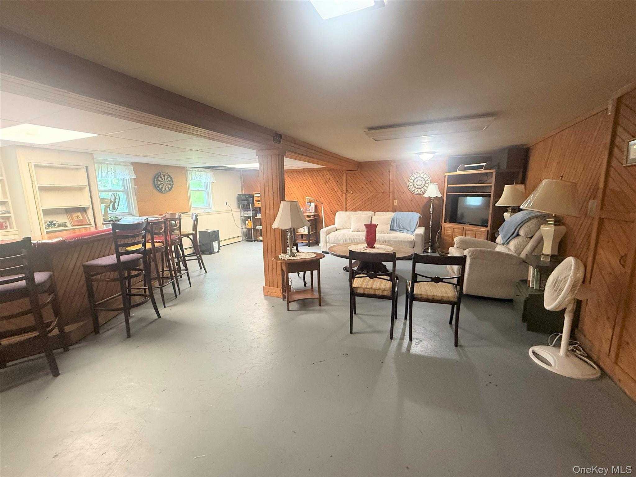 75 Midway Road Amenia, NY 12501 - Photo 13 of 15 a living room with furniture and a large window