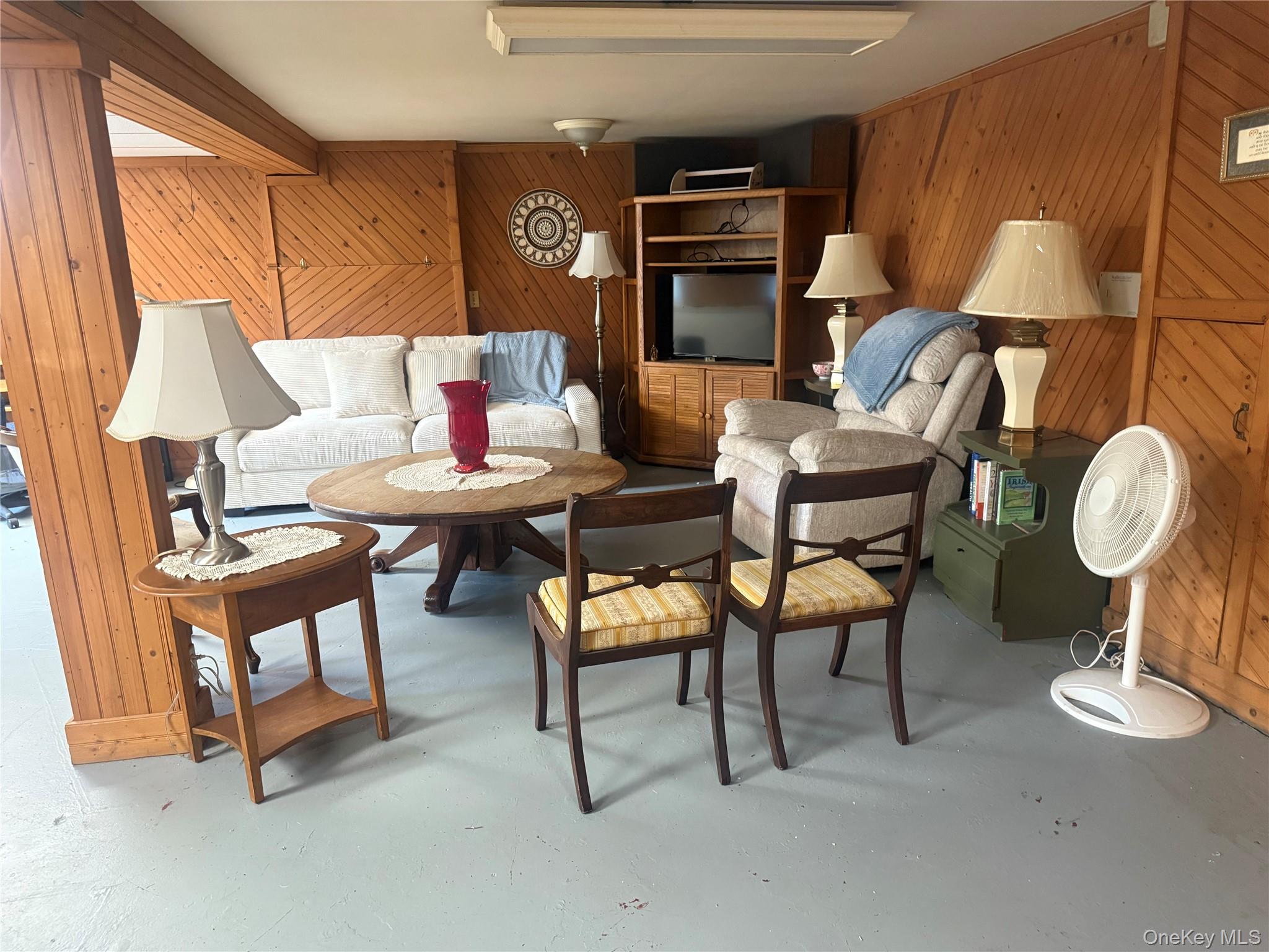 75 Midway Road Amenia, NY 12501 - Photo 14 of 15 a living room with furniture a rug and a lamp