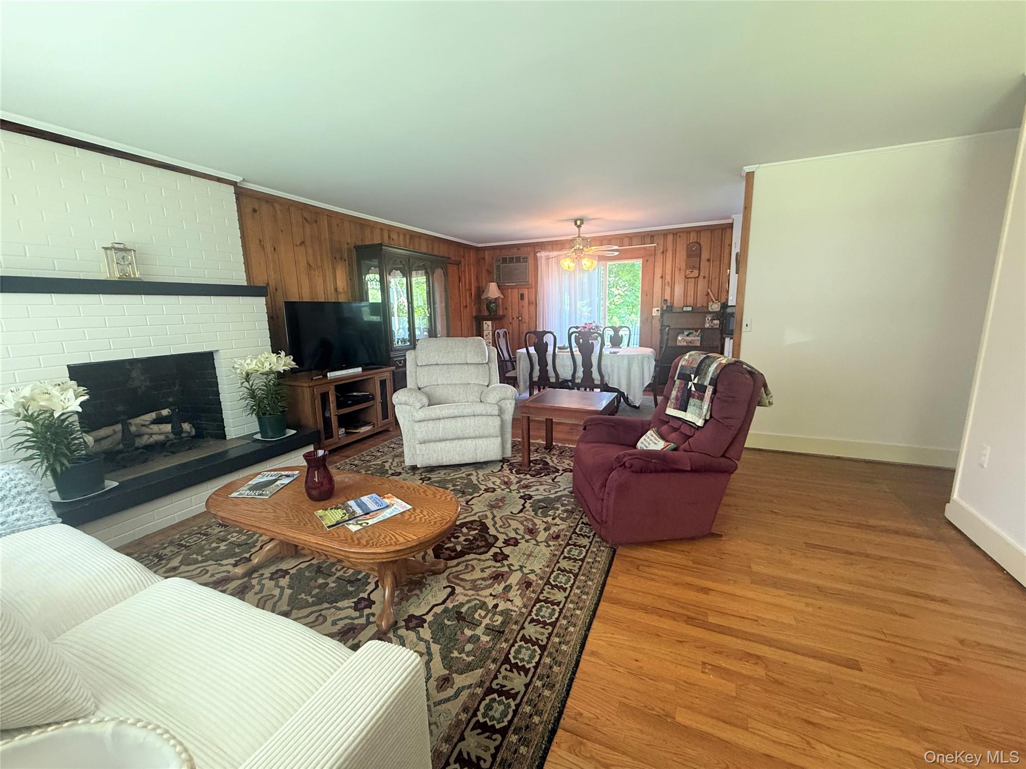 75 Midway Road Amenia, NY 12501 - Photo 3 of 15 a living room with furniture and a fireplace