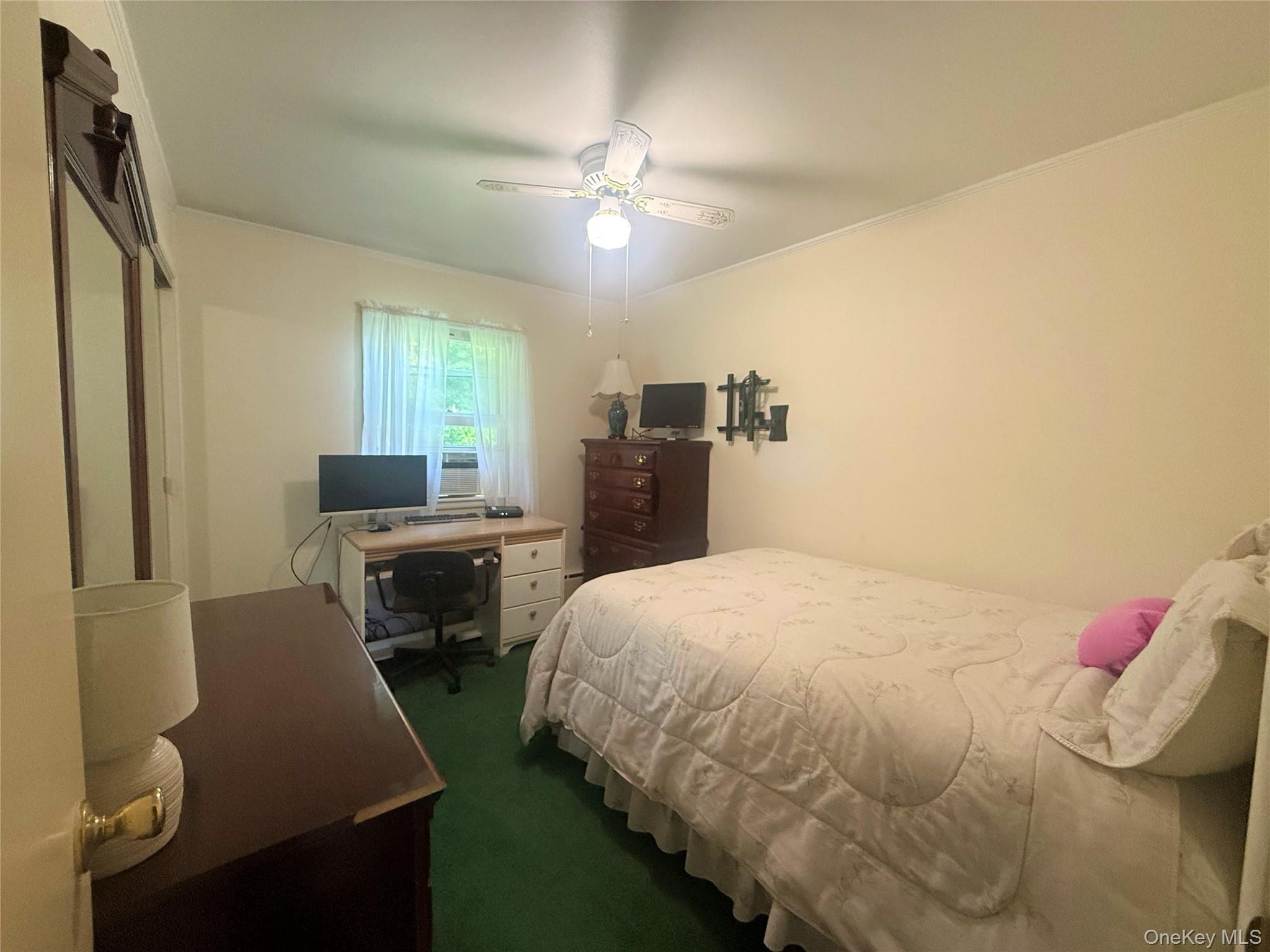 75 Midway Road Amenia, NY 12501 - Photo 9 of 15 a bedroom with a bed and a chandelier