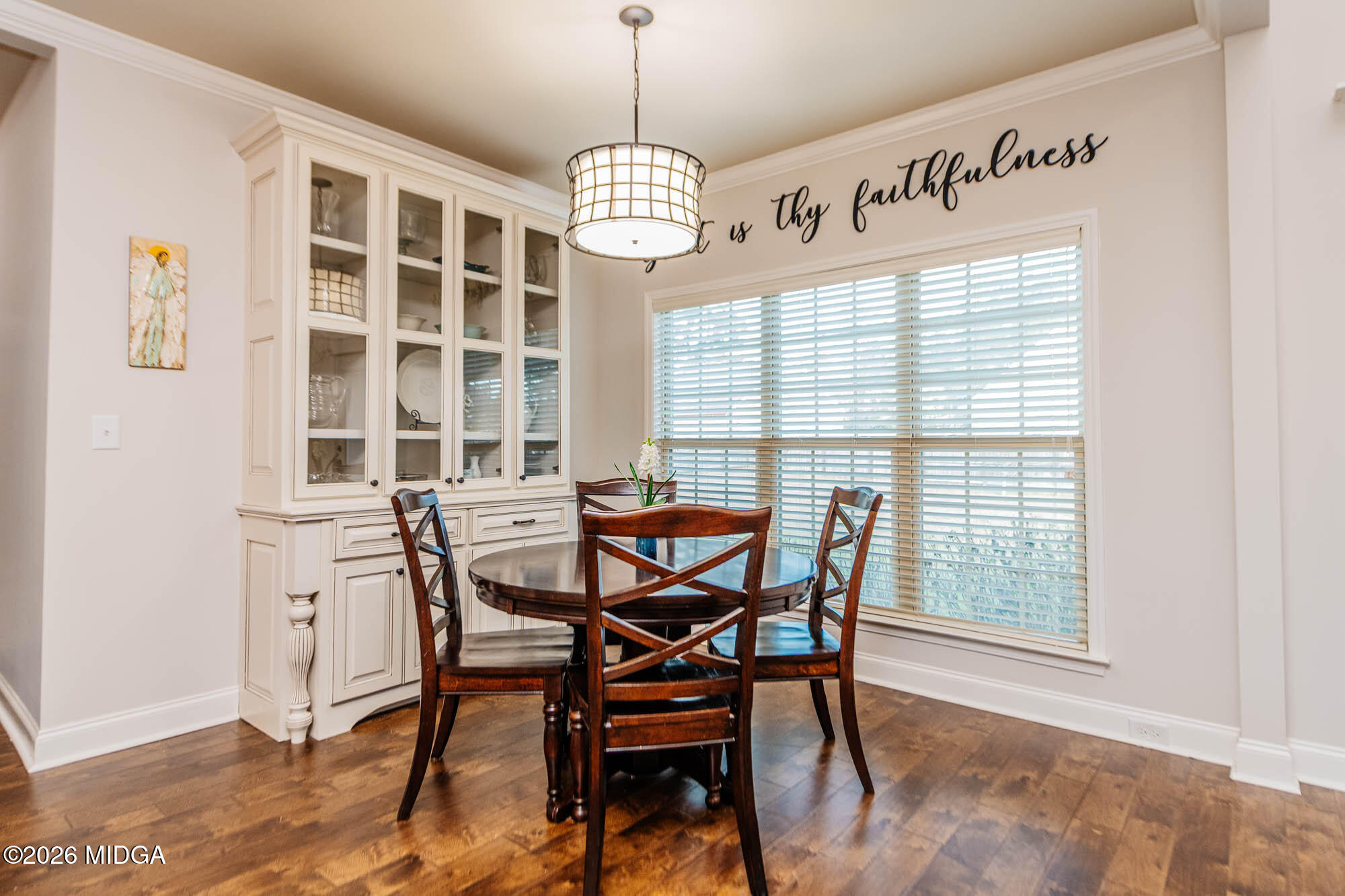 112 Bainbridge Lane Perry, GA 31069 - Photo 13 of 37 a view of a dining room with furniture window and wooden floor