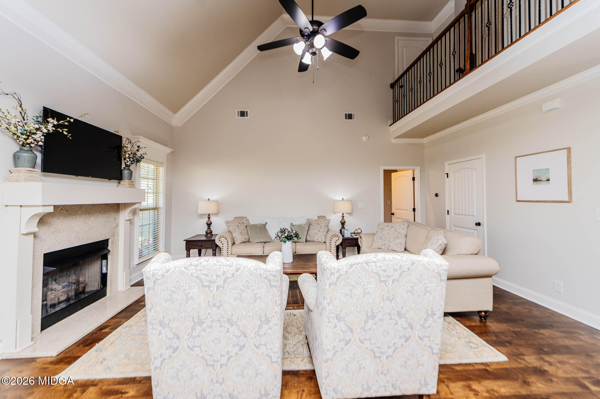 112 Bainbridge Lane Perry, GA 31069 - Photo 17 of 37 a living room with fireplace furniture and a flat screen tv