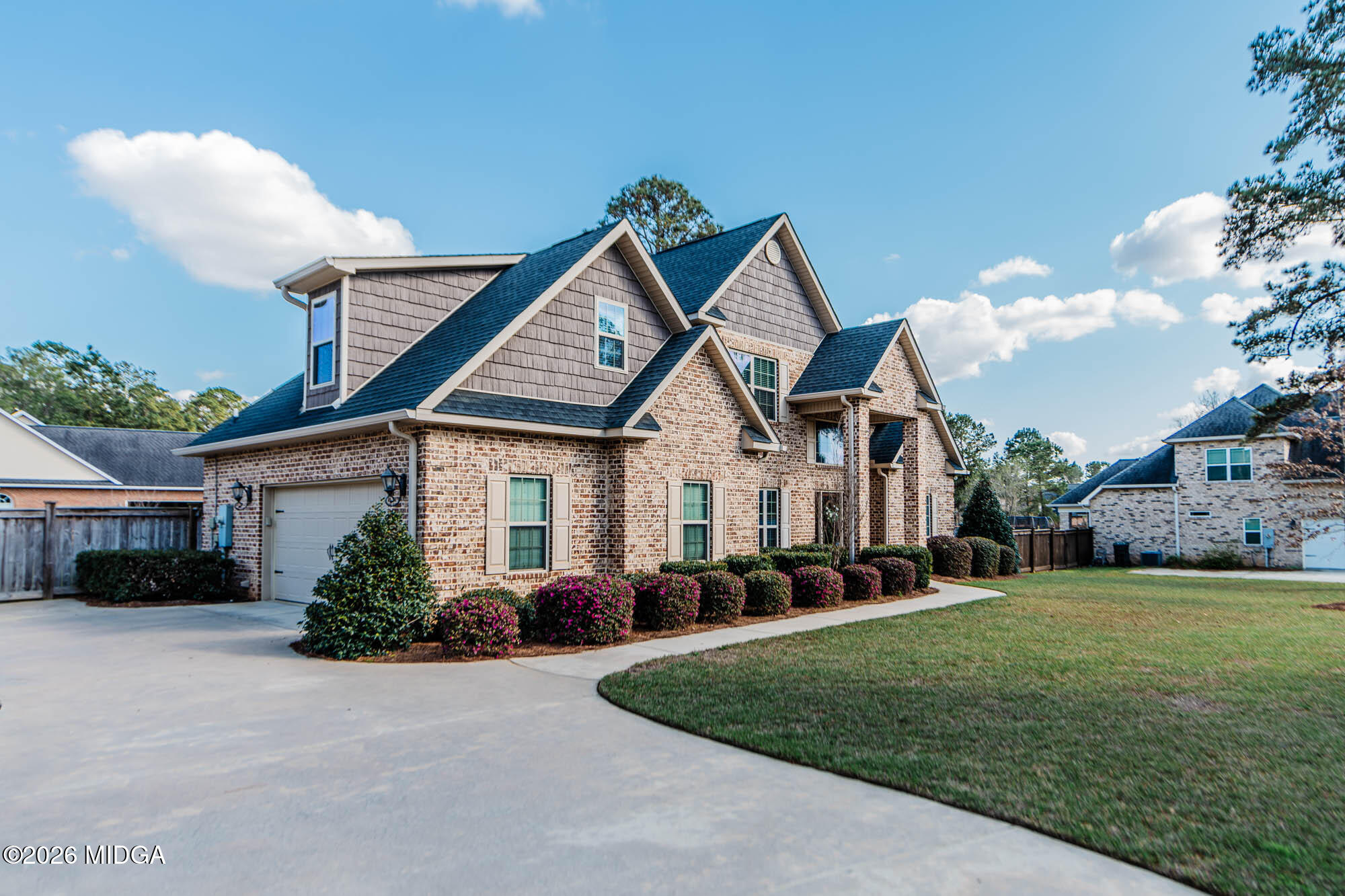 112 Bainbridge Lane Perry, GA 31069 - Photo 3 of 37 a front view of house with yard and green space