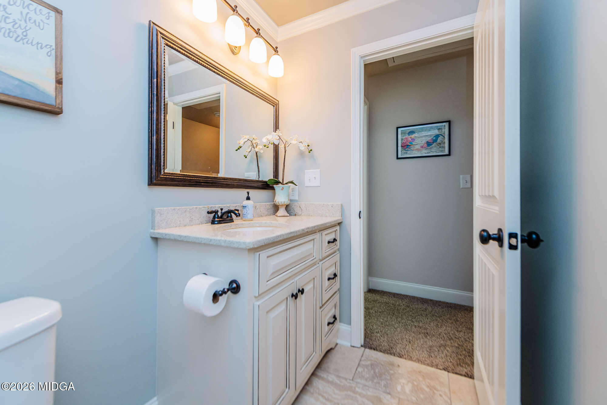 112 Bainbridge Lane Perry, GA 31069 - Photo 31 of 37 a bathroom with a sink and a mirror