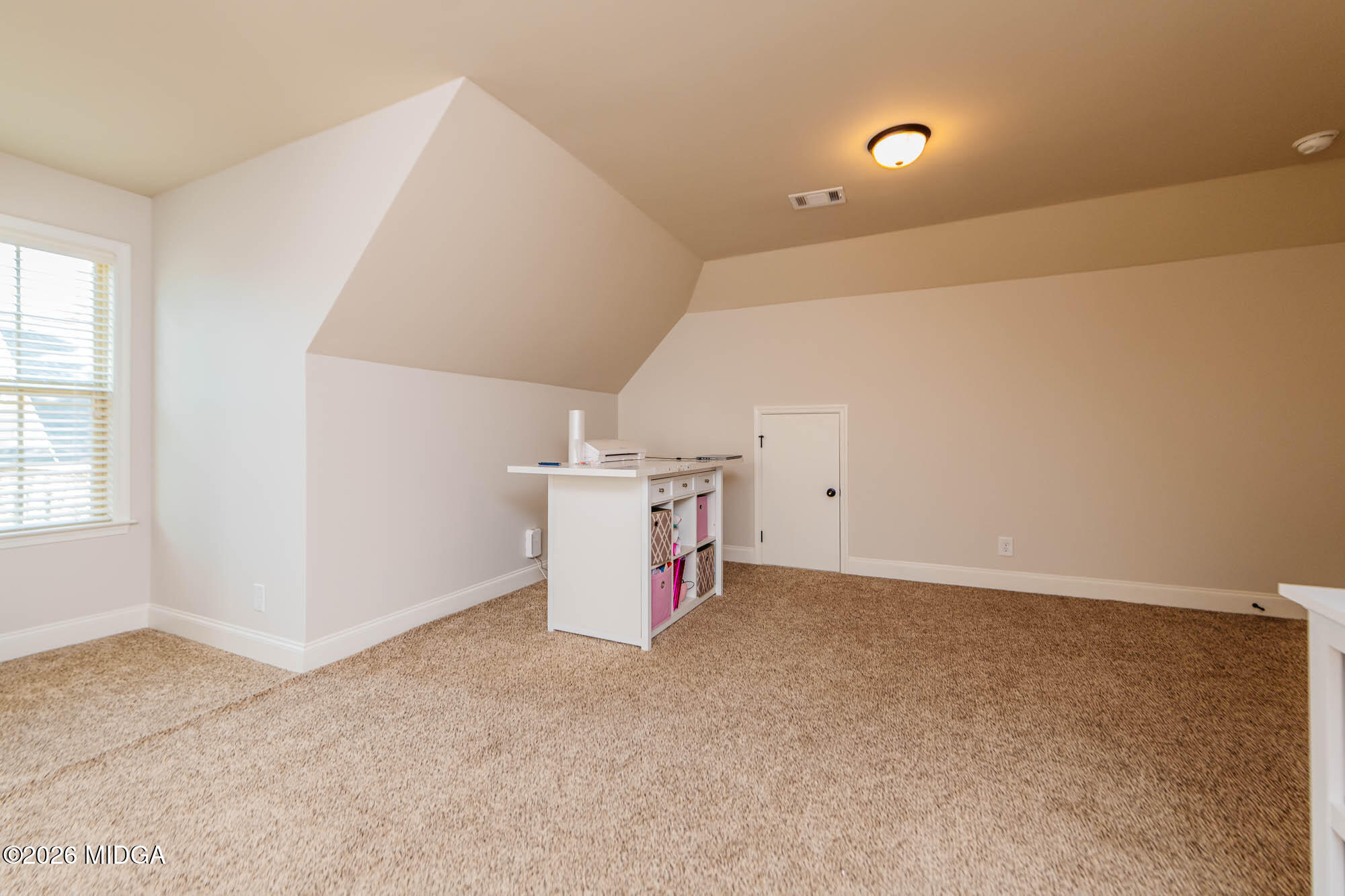 112 Bainbridge Lane Perry, GA 31069 - Photo 36 of 37 en empty room with windows