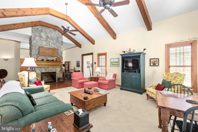 a bathroom with a sink mirror and a bath tub