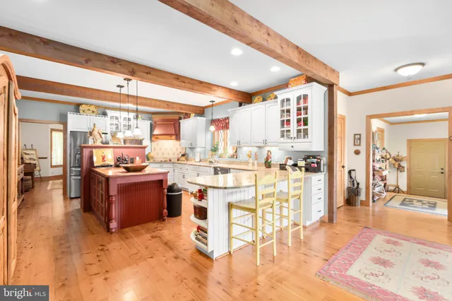a bed room with a bed and a chandelier