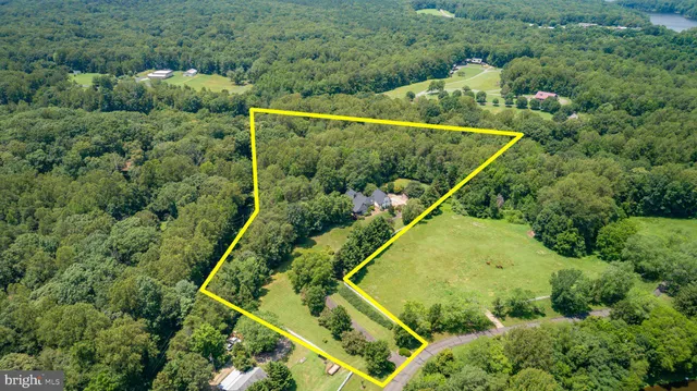 a front view of a house with swimming pool