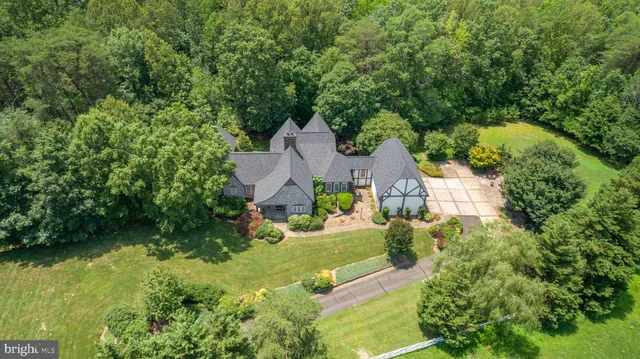 an aerial view of residential house with an outdoor space