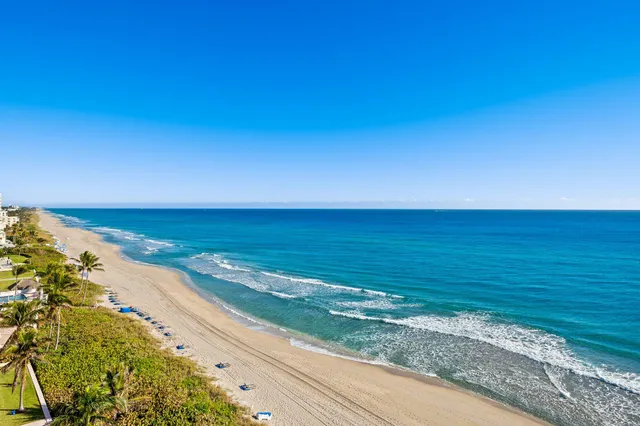 a backyard of a house with outdoor seating