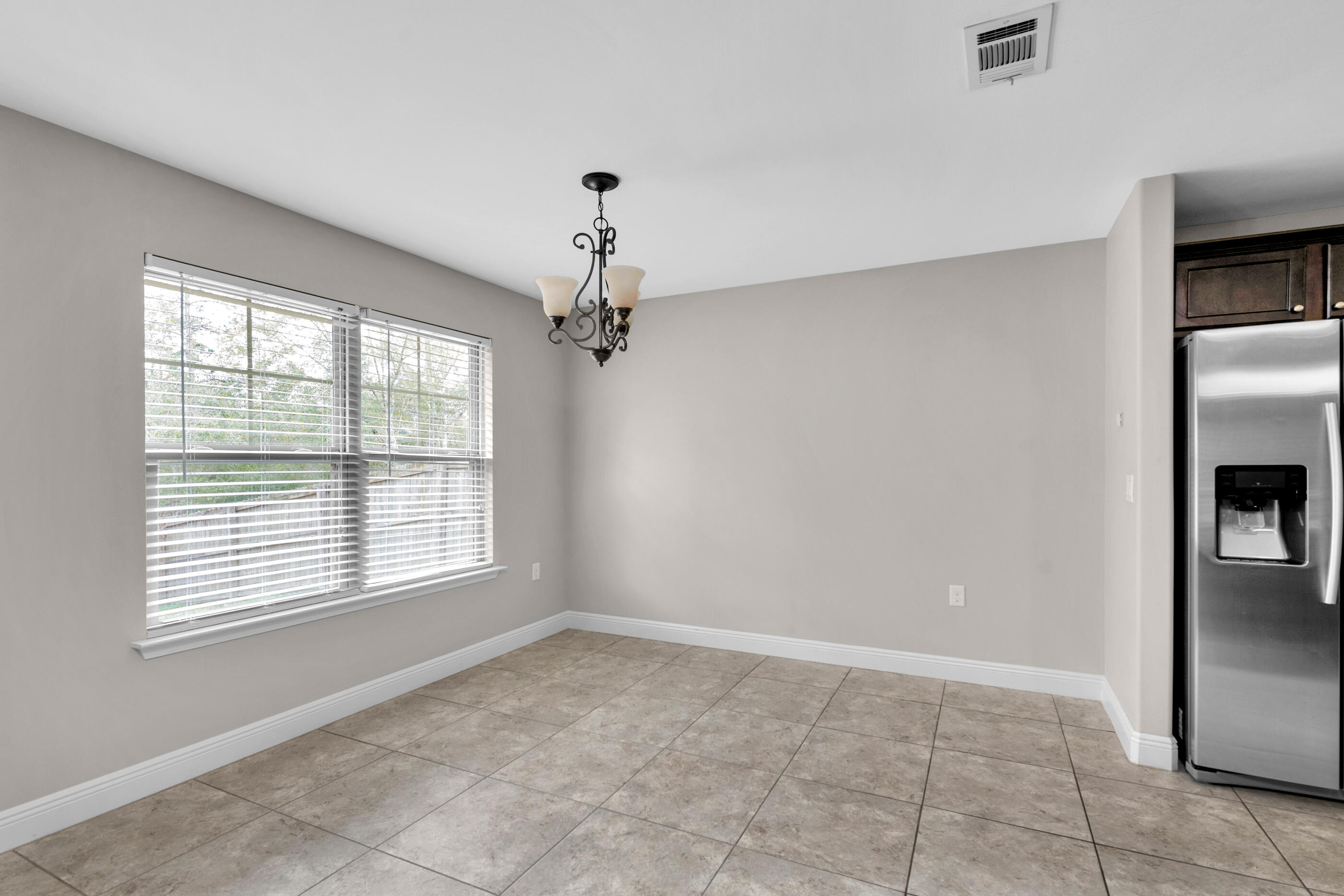 118 Trailwood Lane Crestview, FL 32539 - Photo 14 of 32 a view of an empty room with a window