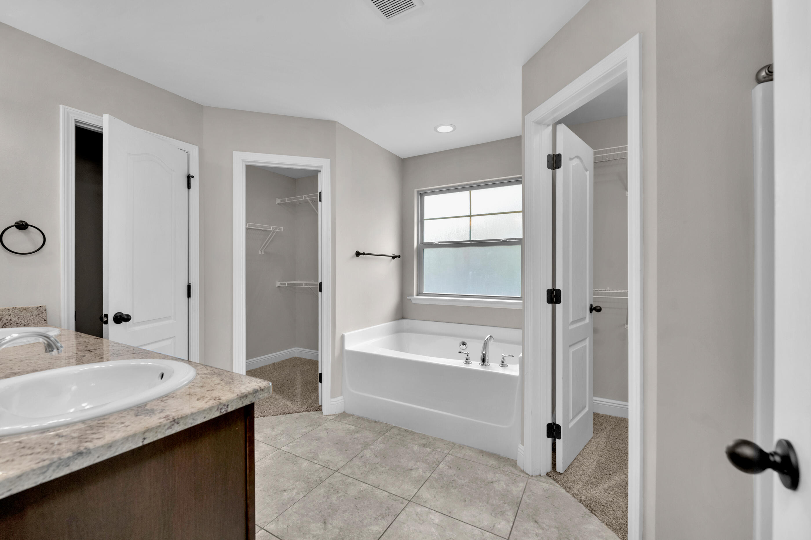 118 Trailwood Lane Crestview, FL 32539 - Photo 19 of 32 a bathroom with a granite countertop tub sink and mirror