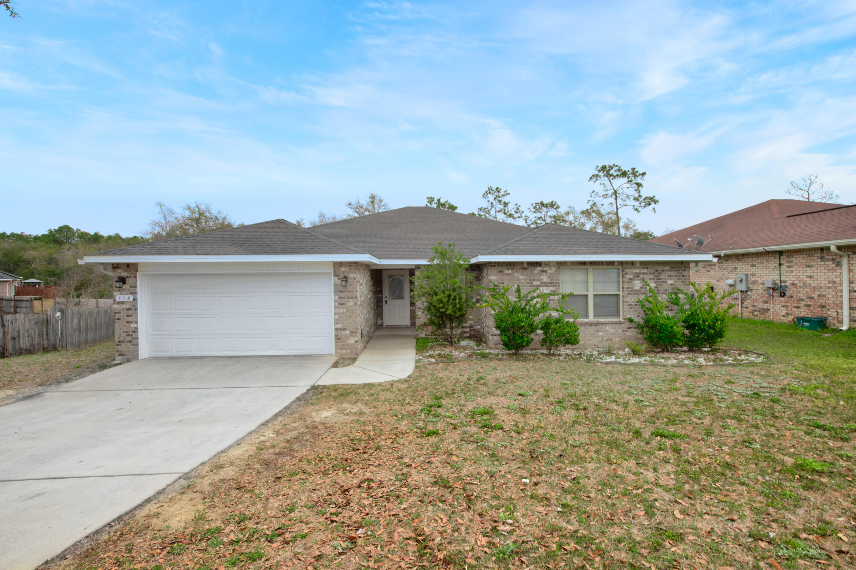 118 Trailwood Lane Crestview, FL 32539 - Photo 2 of 32 front view of a house with a yard