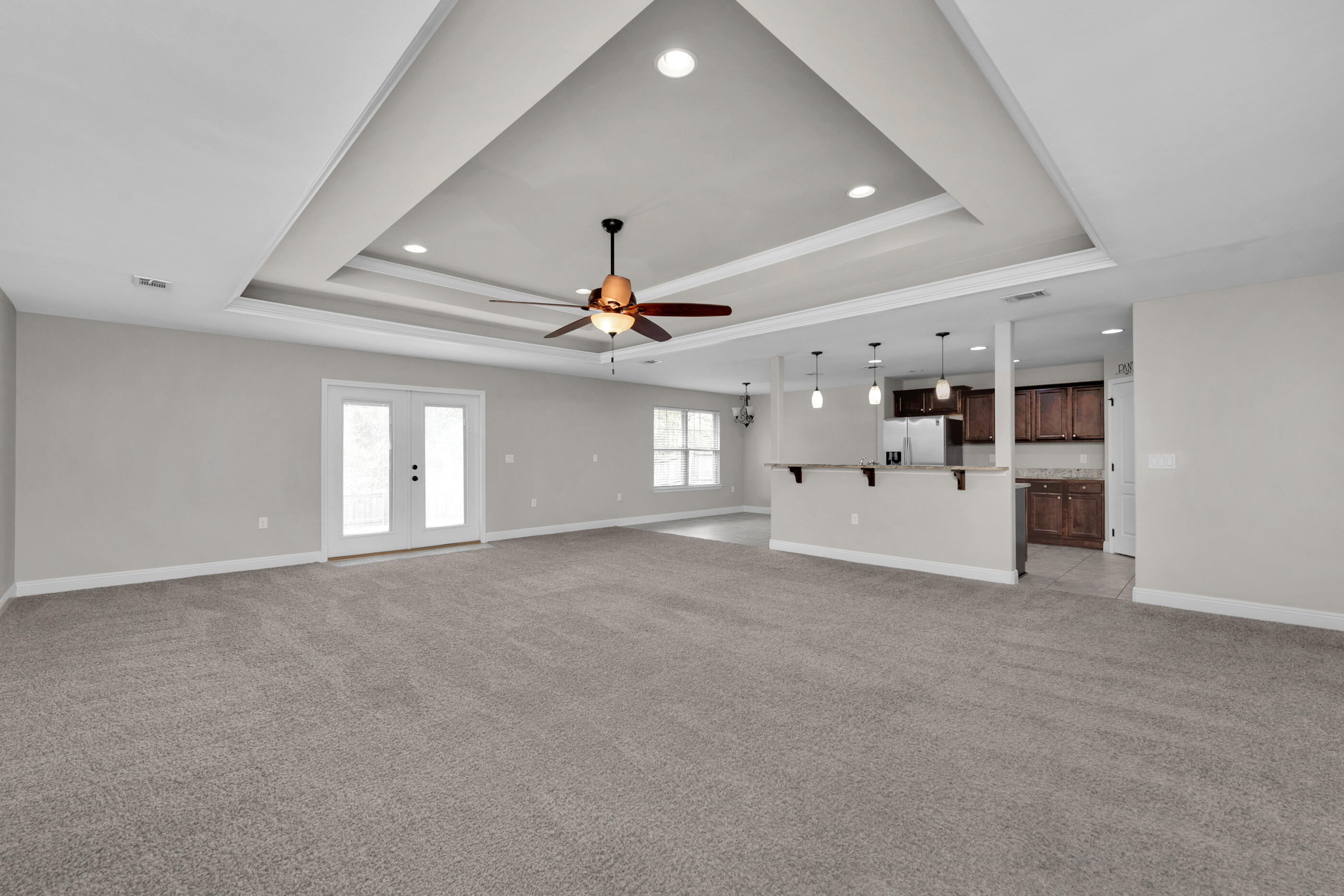 118 Trailwood Lane Crestview, FL 32539 - Photo 3 of 32 a view of a livingroom with a ceiling fan and window