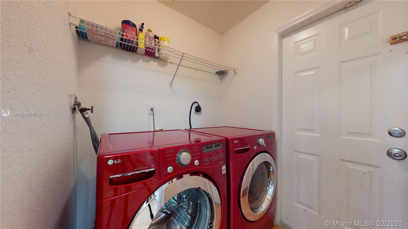 12355 Southwest 124th Terrace Miami, FL 33186 - Photo 25 of 61 a utility room with dryer and washer