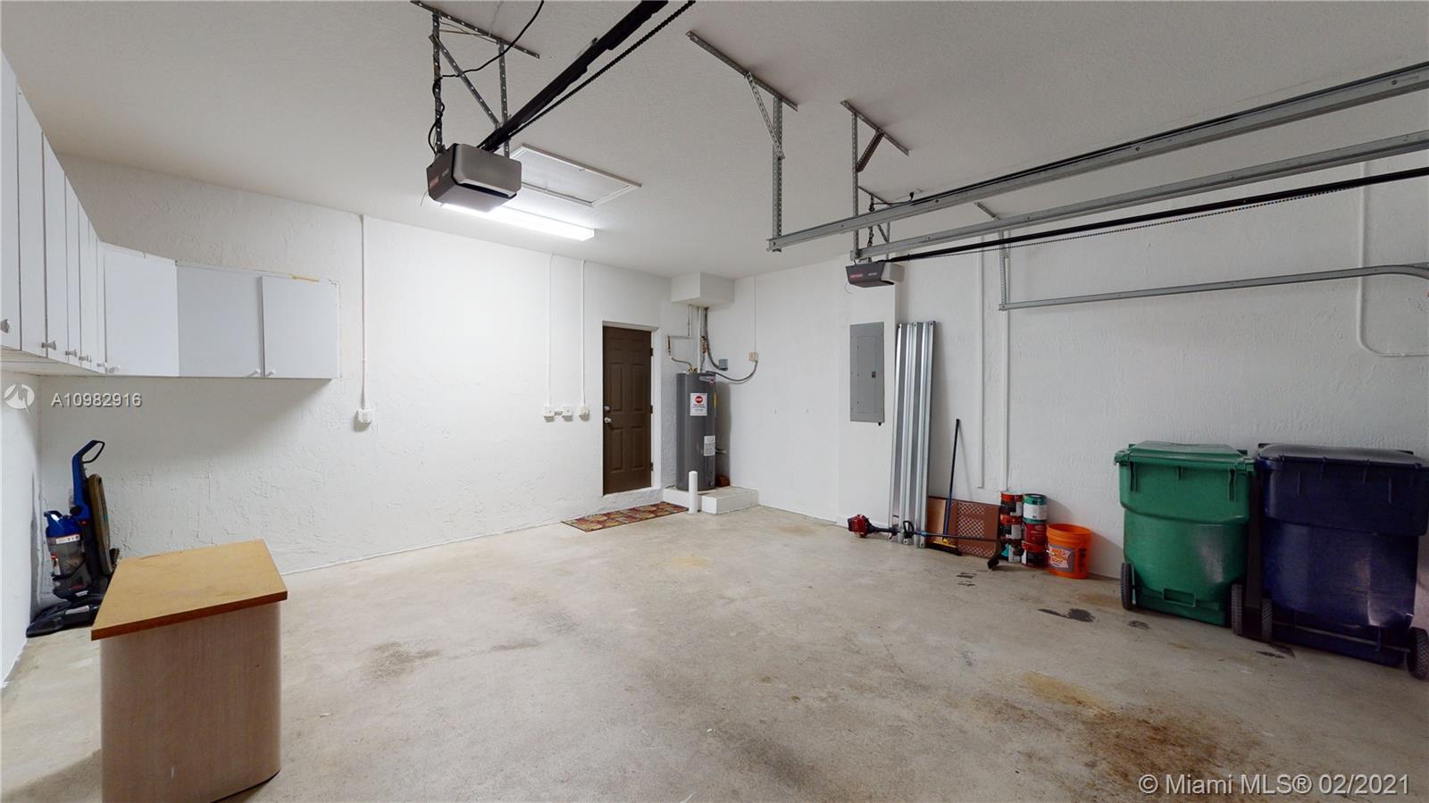 12355 Southwest 124th Terrace Miami, FL 33186 - Photo 27 of 61 a view of a storage & utility room with two washing machine