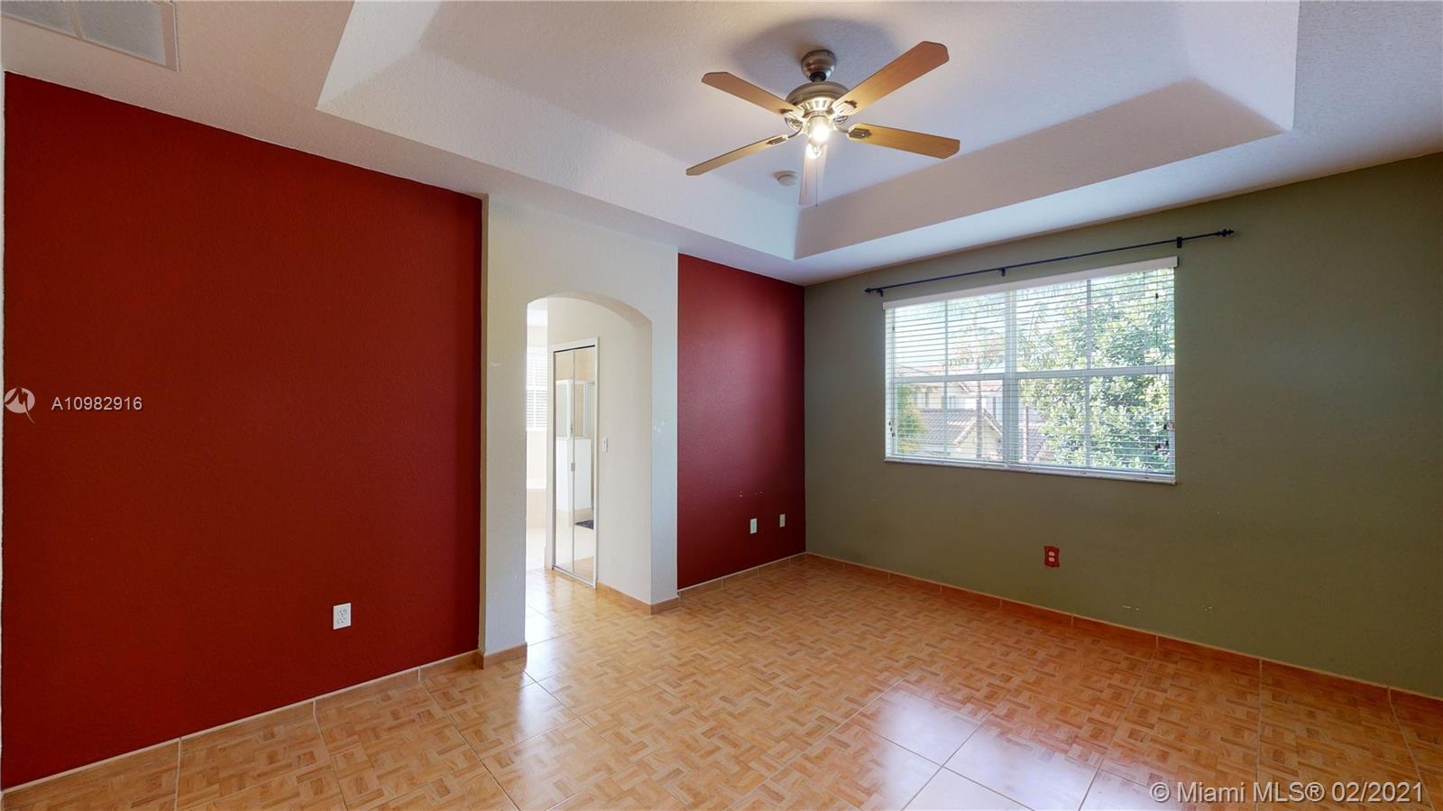 12355 Southwest 124th Terrace Miami, FL 33186 - Photo 38 of 61 a view of an empty room with a window