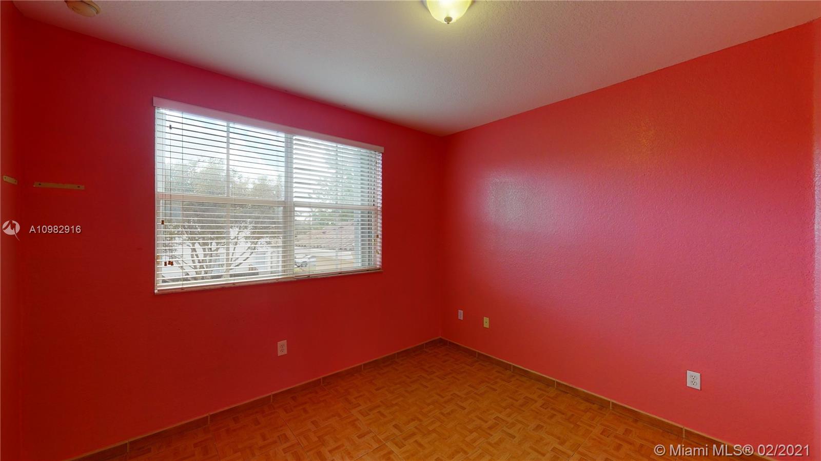 12355 Southwest 124th Terrace Miami, FL 33186 - Photo 46 of 61 a view of an empty room with a window