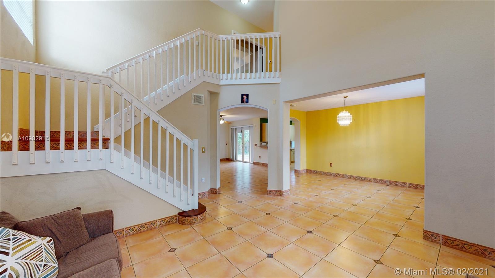 12355 Southwest 124th Terrace Miami, FL 33186 - Photo 6 of 61 a view of an entryway with a livingroom