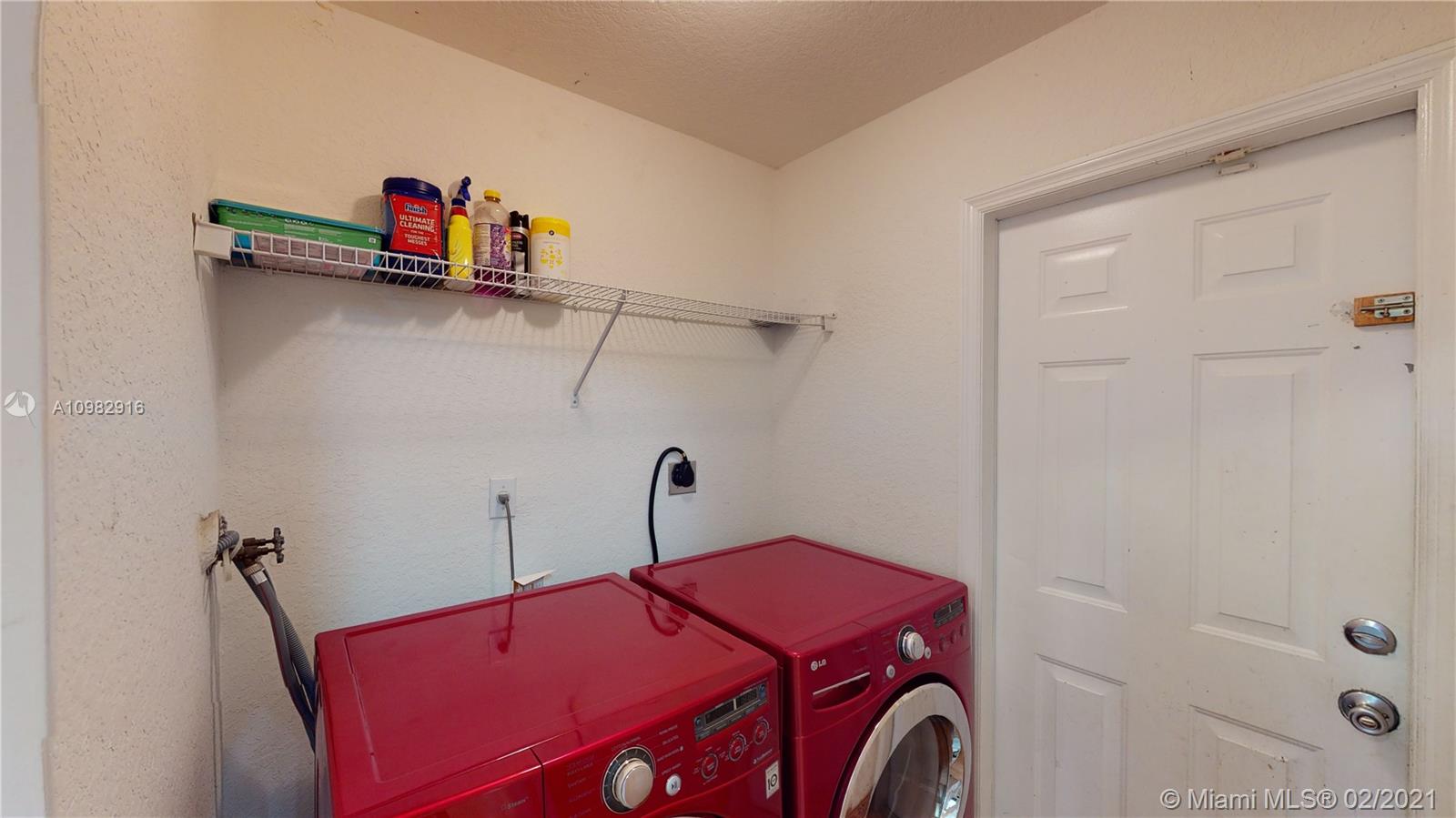 12355 Southwest 124th Terrace Miami, FL 33186 - Photo 60 of 61 a utility room with dryer and washer