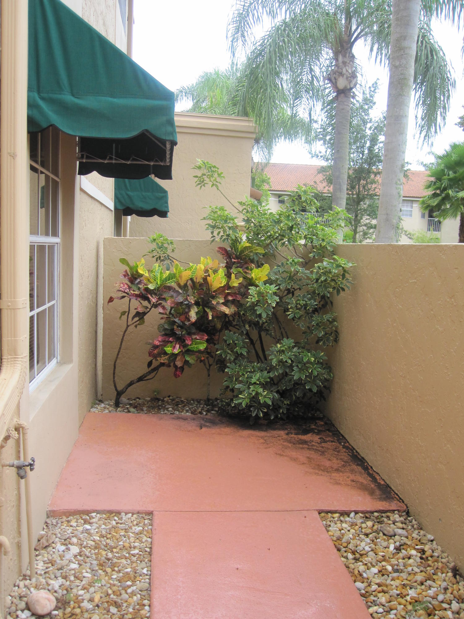6530 Via Regina, Unit 5 Boca Raton, FL 33433 - Photo 2 of 13 Front patio
