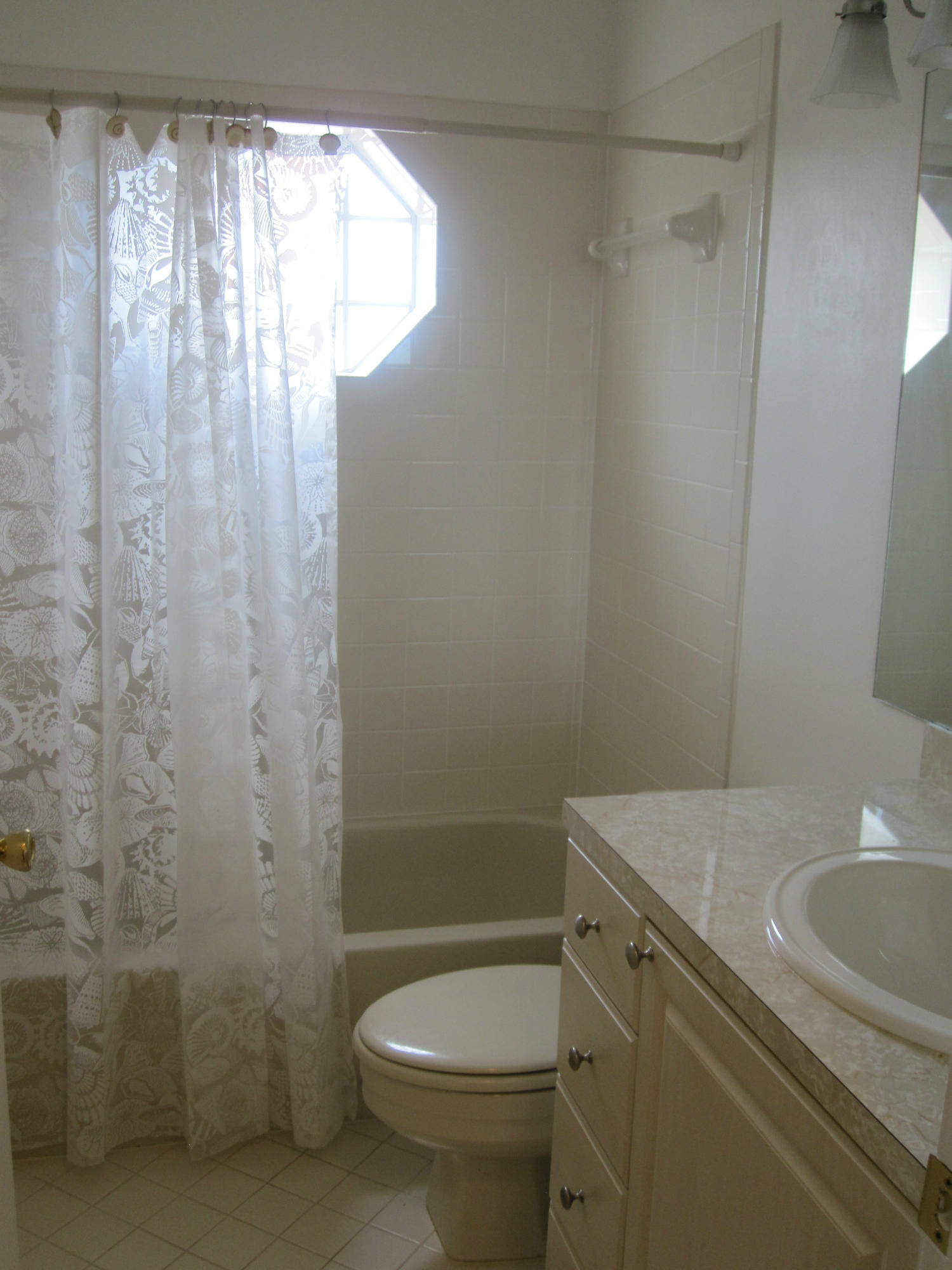 6530 Via Regina, Unit 5 Boca Raton, FL 33433 - Photo 9 of 13 2nd bathroom