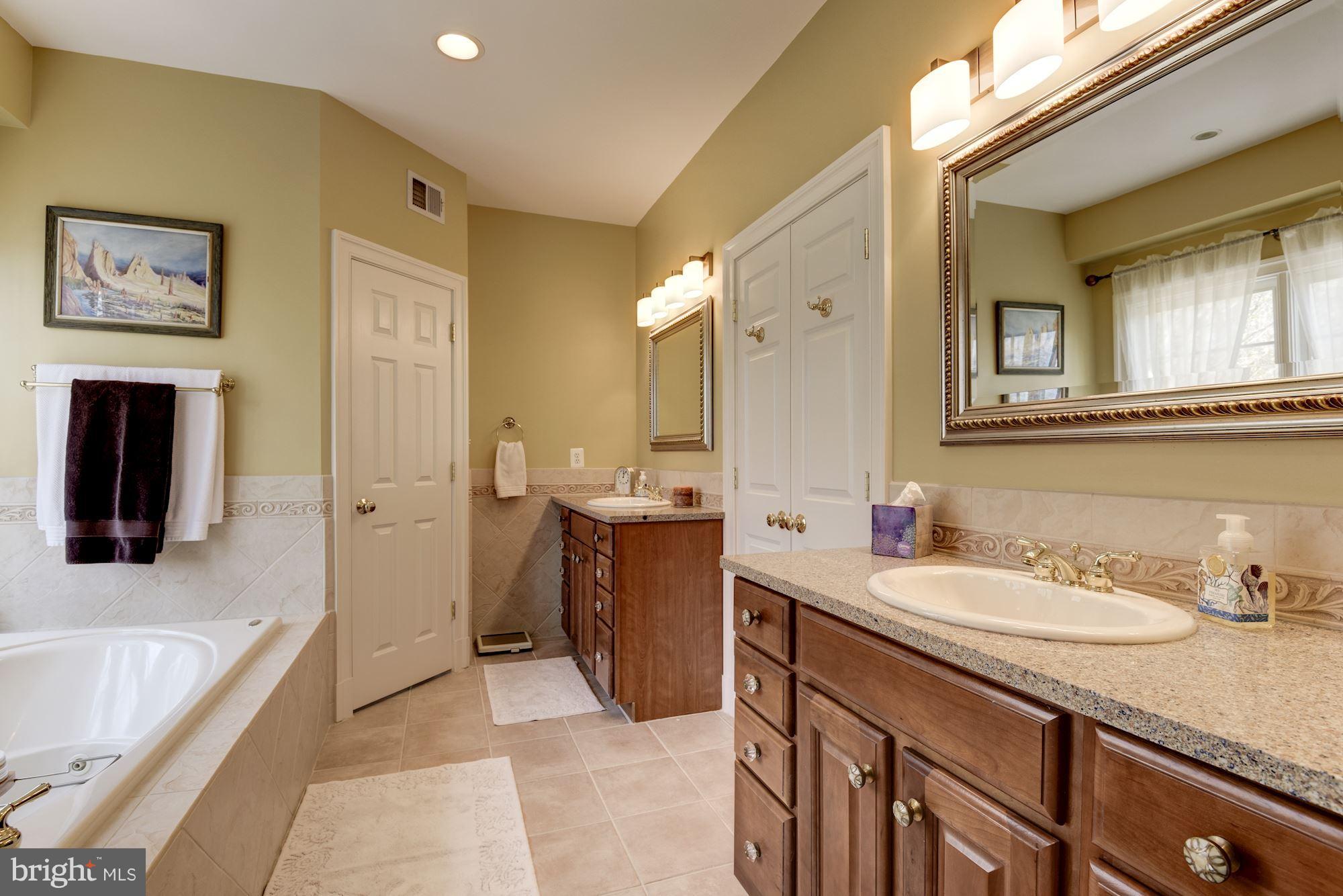 11203 Gunston Road Lorton, VA 22079 - Photo 30 of 61 Master Bathroom with Separate Vanities