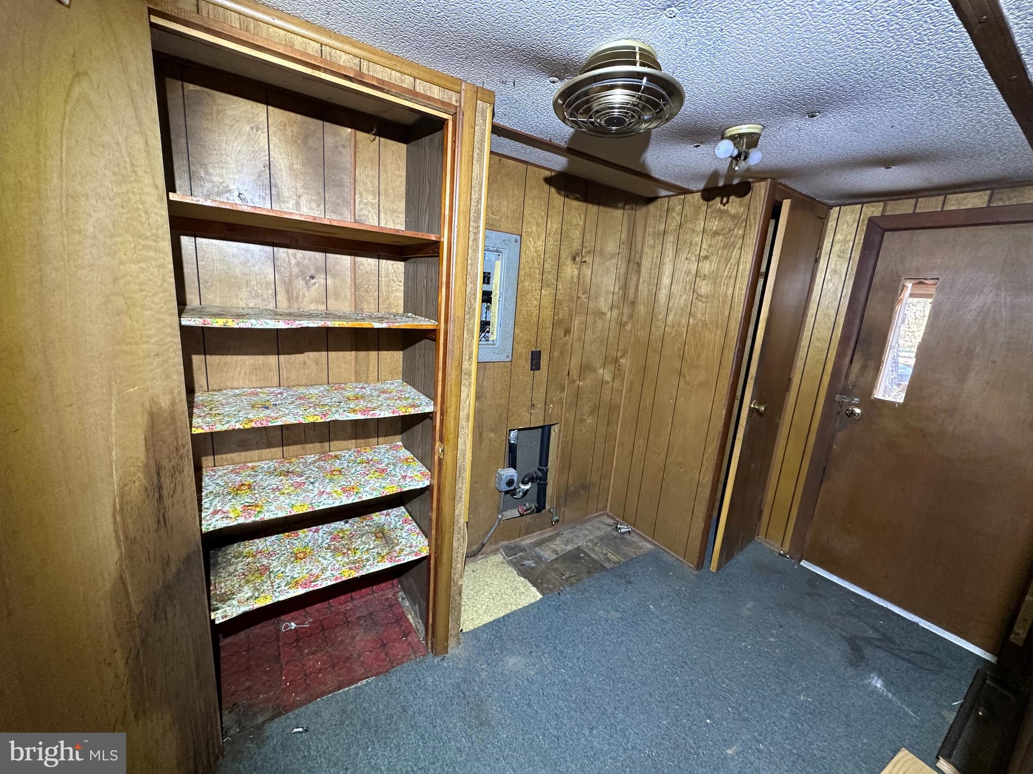 18739 East Wilson Road Southeast Oldtown, MD 21555 - Photo 11 of 21 a view of an empty room with wooden floor and a window