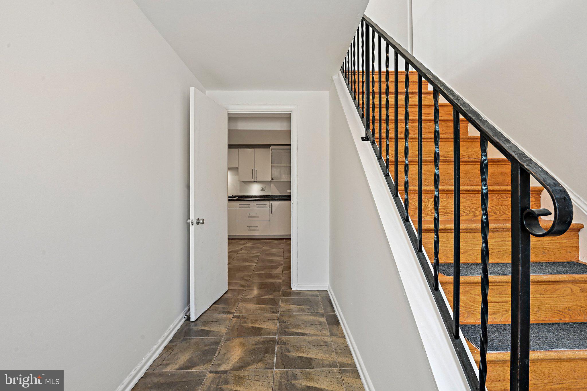 6713 Old Chesterbrook Road McLean, VA 22101 - Photo 15 of 38 a view of staircase with wooden floor and stairs